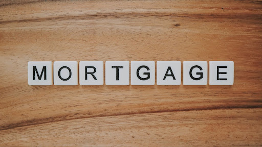 The word “Mortgage” in Scrabble letters.